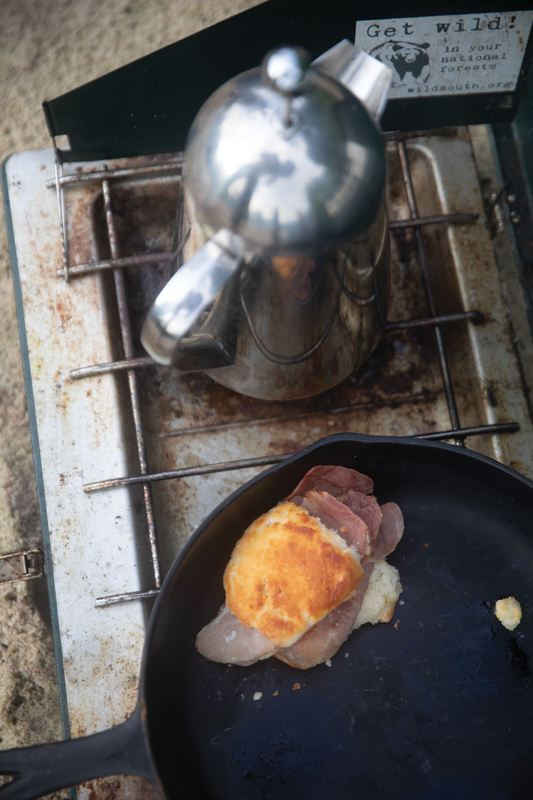 Sewee Outpost country ham biscuits taste even better off a cast-iron skillet on a sandbar.