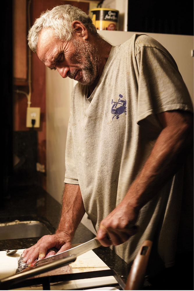 Shawn White (Stephen’s brother) prepares a breakfast of fresh shrimp, eggs, grits, biscuits, and bacon around 6 a.m.