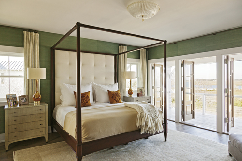 Suite Views: A piazza off the couple’s bedroom overlooks the marsh, while the windows in their bath offer harbor views.