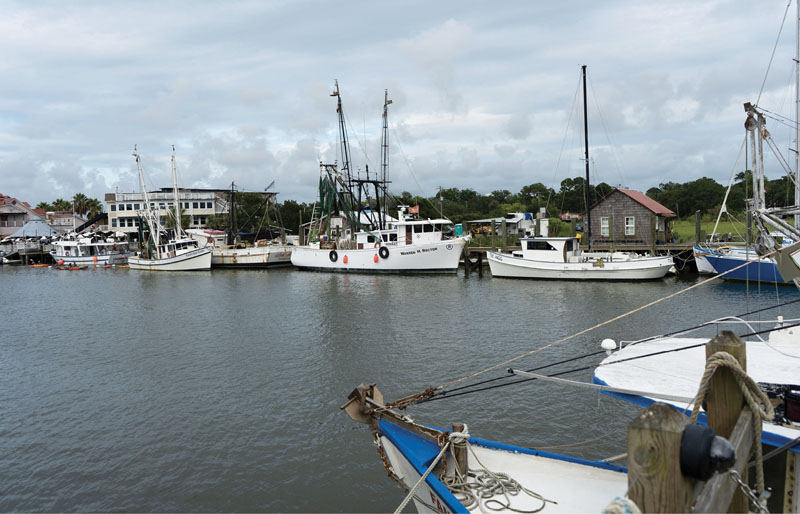 After docking and unloading the catch, the trawler is cleaned, fueled, and readied for the next early morning run.