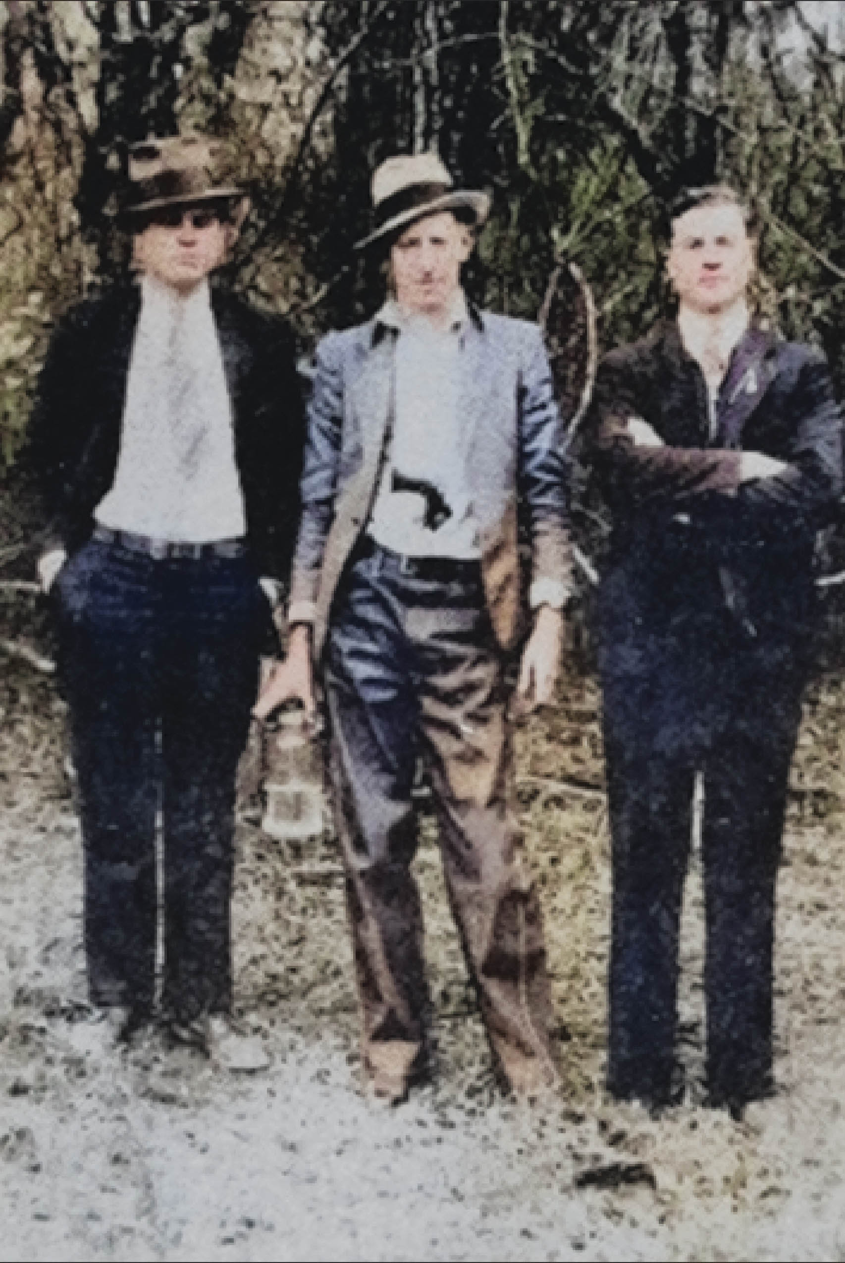 (Left to right)  Al Capone, David Shuler, and an unknown man in Hell Hole Swamp; “Mr. Shuler ran a mercantile store in Jamestown. This photo hung in his store until it closed,” says Jamestown resident Douglas Guerry.