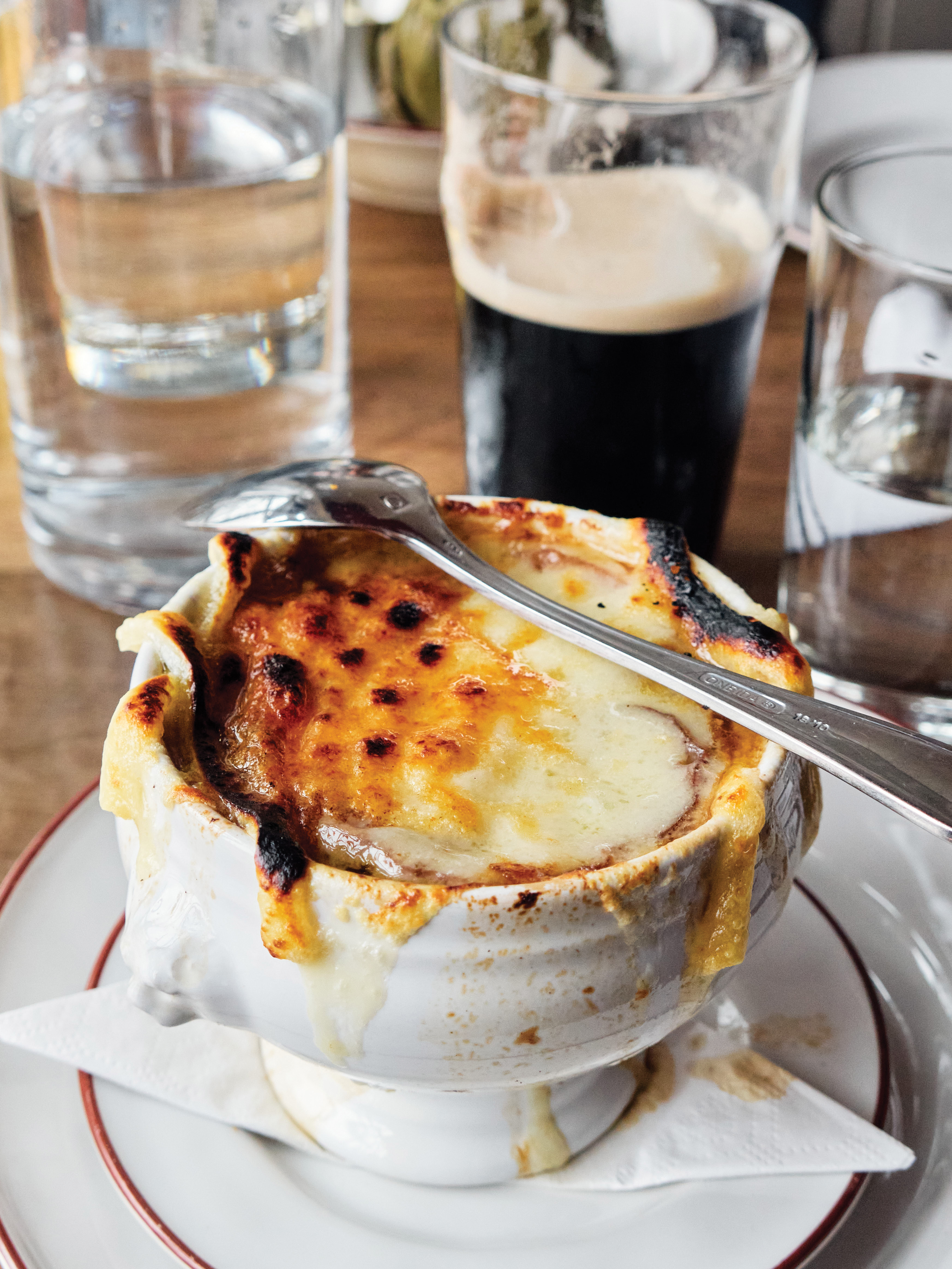 French onion soup and a Guinness for a cozy lunch at Rowdy Hall, Amagansett.