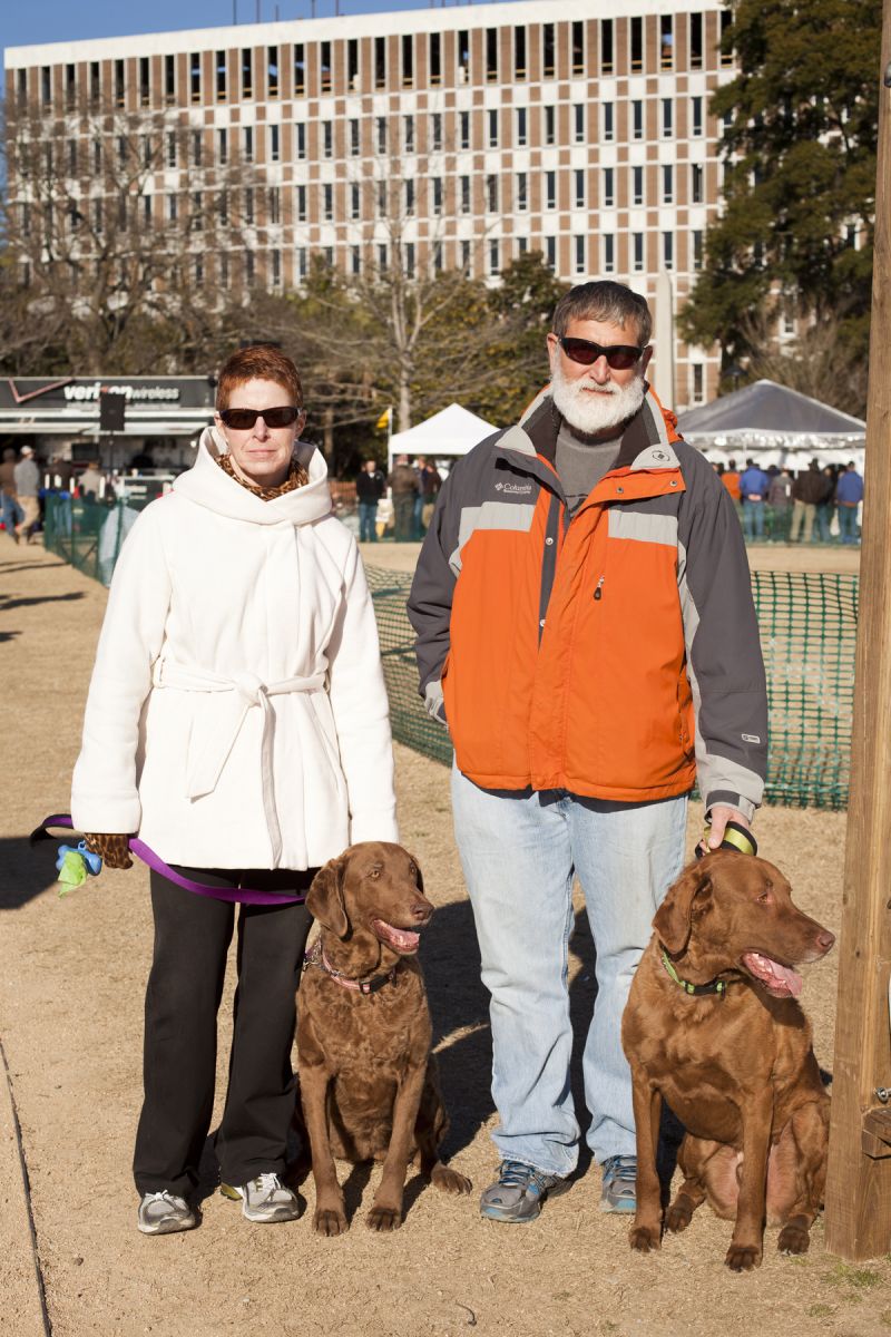 Lucy and Brian Germick with their Chesapeake Bay Retrievers, Kona and Drake