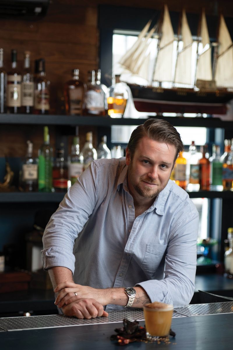 Christain Favier at Seahorse, where he creates culinary-driven cocktails, such as the vegetal Tabbouleh Collins and Ají Sour with charred guajillo pepper (below)