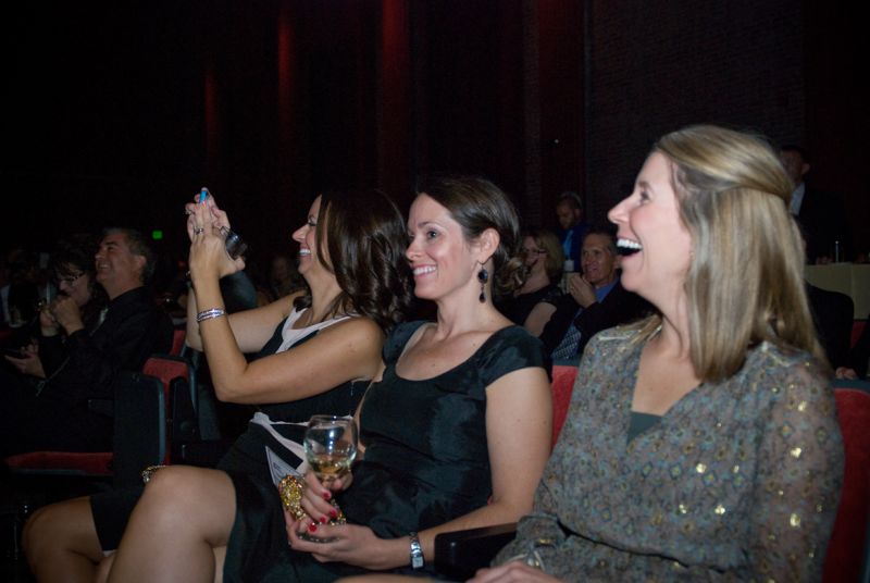 Guests enjoy the night&#039;s flying demonstration