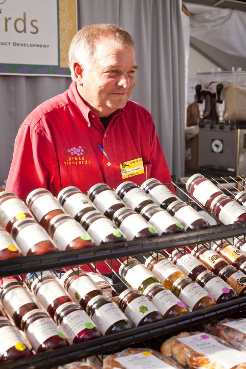 Greg Hyman of Hyman Vineyards displays his homemade jams and jellies.