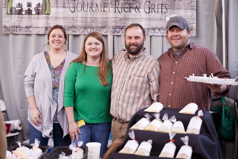 Carolyn Hodge, Tina Patterson, Drew Patterson, and Jay Hodge served up samplings of cheesy grits.