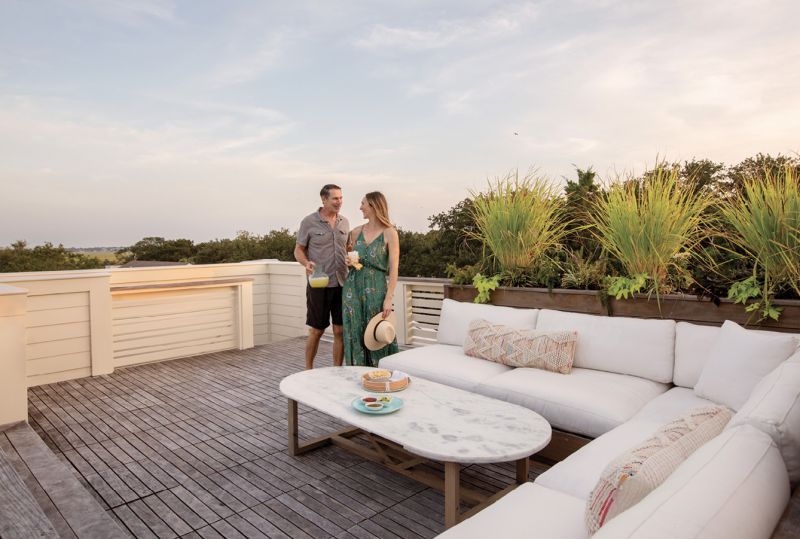 Top of the World: Overstuffed cushions offer the perfect perch for taking in the views of Sullivan’s Island and its lighthouse