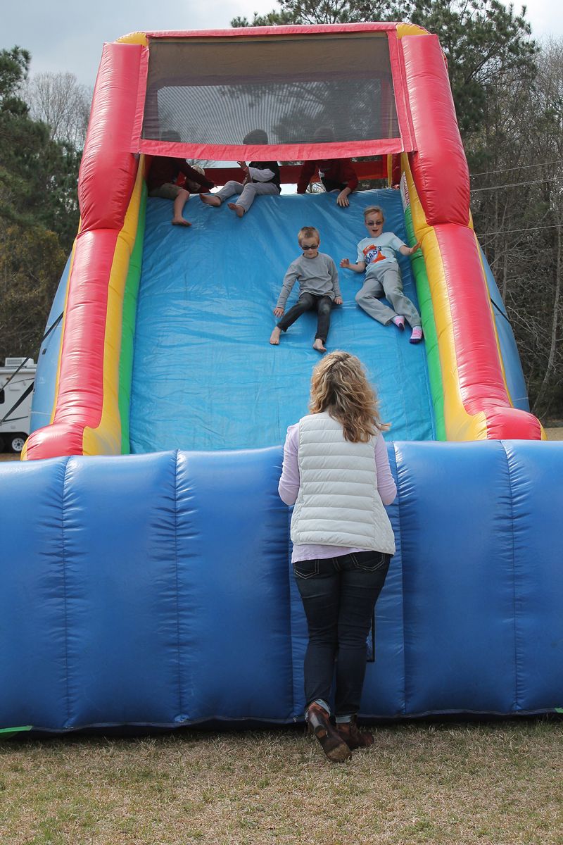 Kids slid down the fun-slide as parents watched