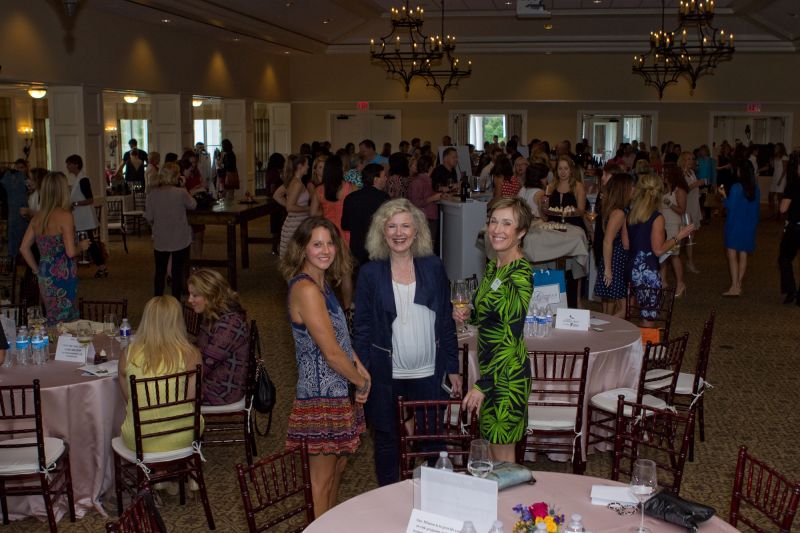 Guests mingled about the space before taking their seats to participate in the live auction.