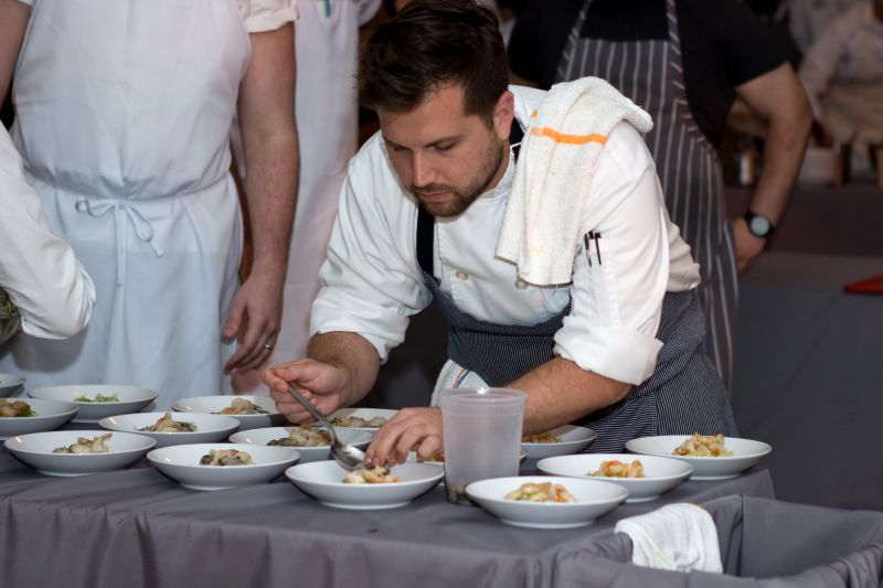 The Cannonborough group prepared its second course of fresh oysters with poached shrimp.