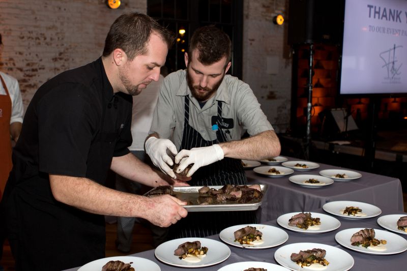 The Off the Peninsula group prepared its main course of NY strip with fried brussel sprouts, turnips, sunchoke, and foie gras jus.