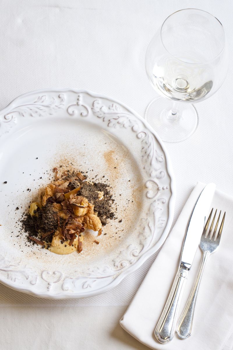 Second course: winterized parsnip cooked in butter, skate wing and almost-burned cream with mushroom, cress, and fermented cabbage juice