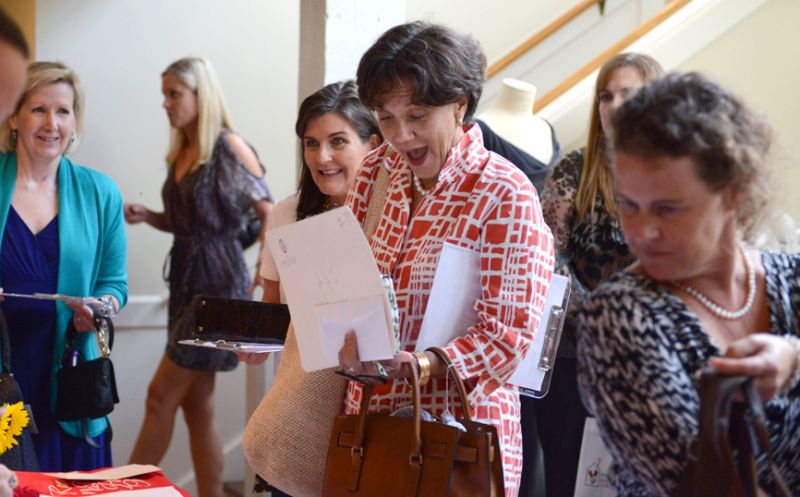 Those who won bags opened them to find surprise gifts, from mani pedi certificates to a weekend at The Sanctuary on Kiawah Island.