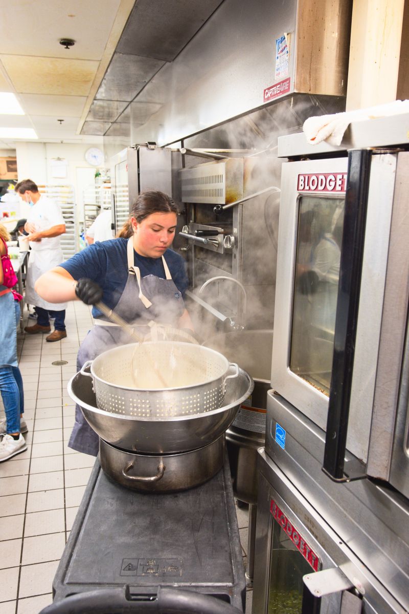 Chloe Farkouh checks the gnocchi.