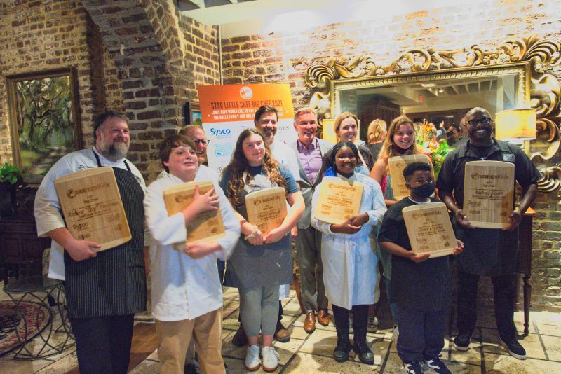 (Left to right) Richard Plaistowe, Trevin Lamber, Jacques Larson, Chloe Farkouh, Mike Lata, Louis Yuhasz, Journee Myers, Carrie Morey, Claudia Hassell, Grant Higgins, and Rodney Scott