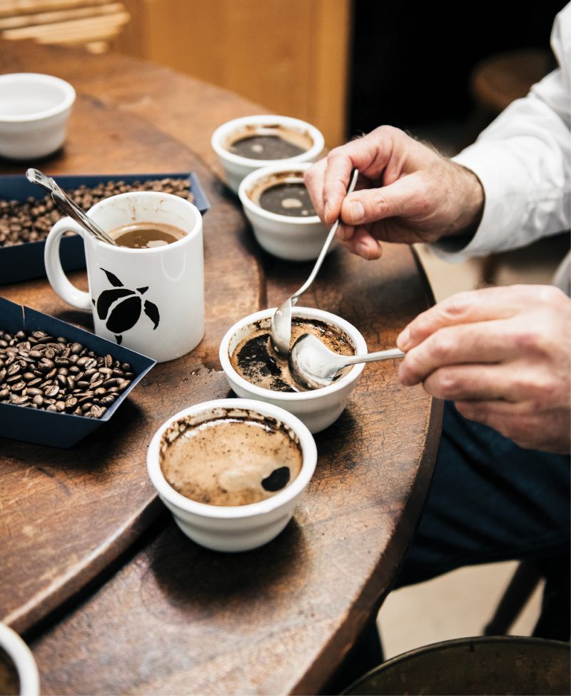 Higher Grounds: Charleston Coffee Roasters’s Lowell Grosse demonstrates the art of cupping using deep spoons made expressly for the practice.