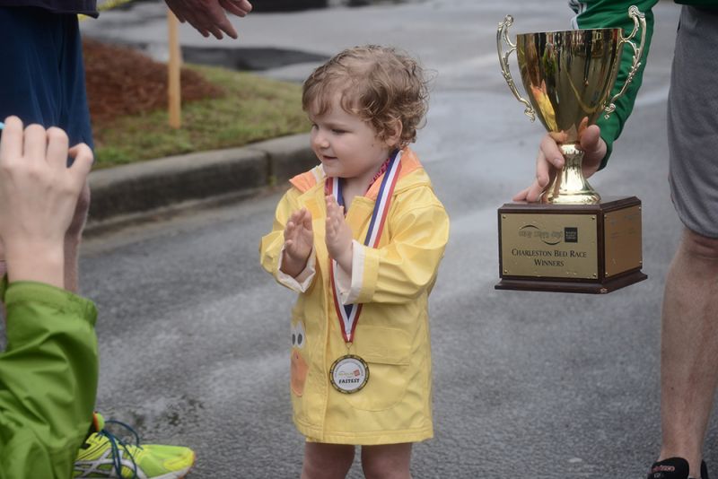 A King of POPS representative congratulates her team.