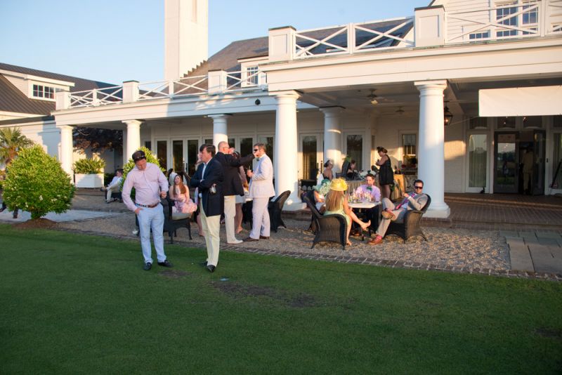 Guests socialized and sipped mint juleps.