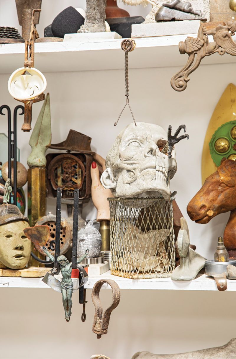 His dark and powerful transmutations are built from objects he collects and stores in categories—figurines, ammunition, machinery parts—around his studio.