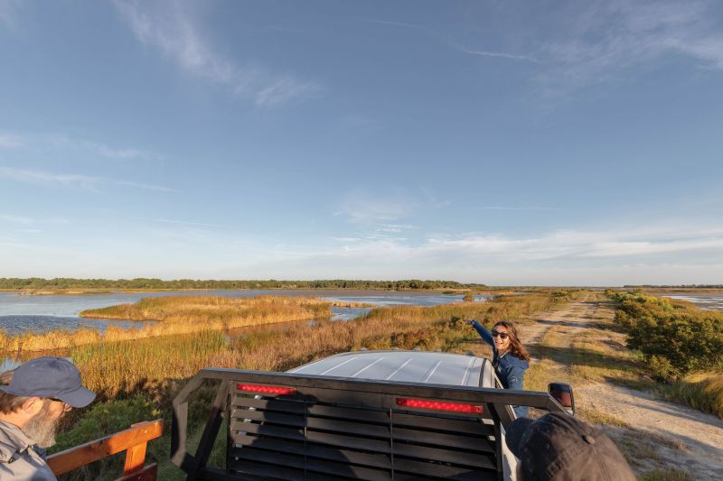 Coastal Expeditions naturalist Annie Owen educates visitors about the flora and fauna on Bulls Island.