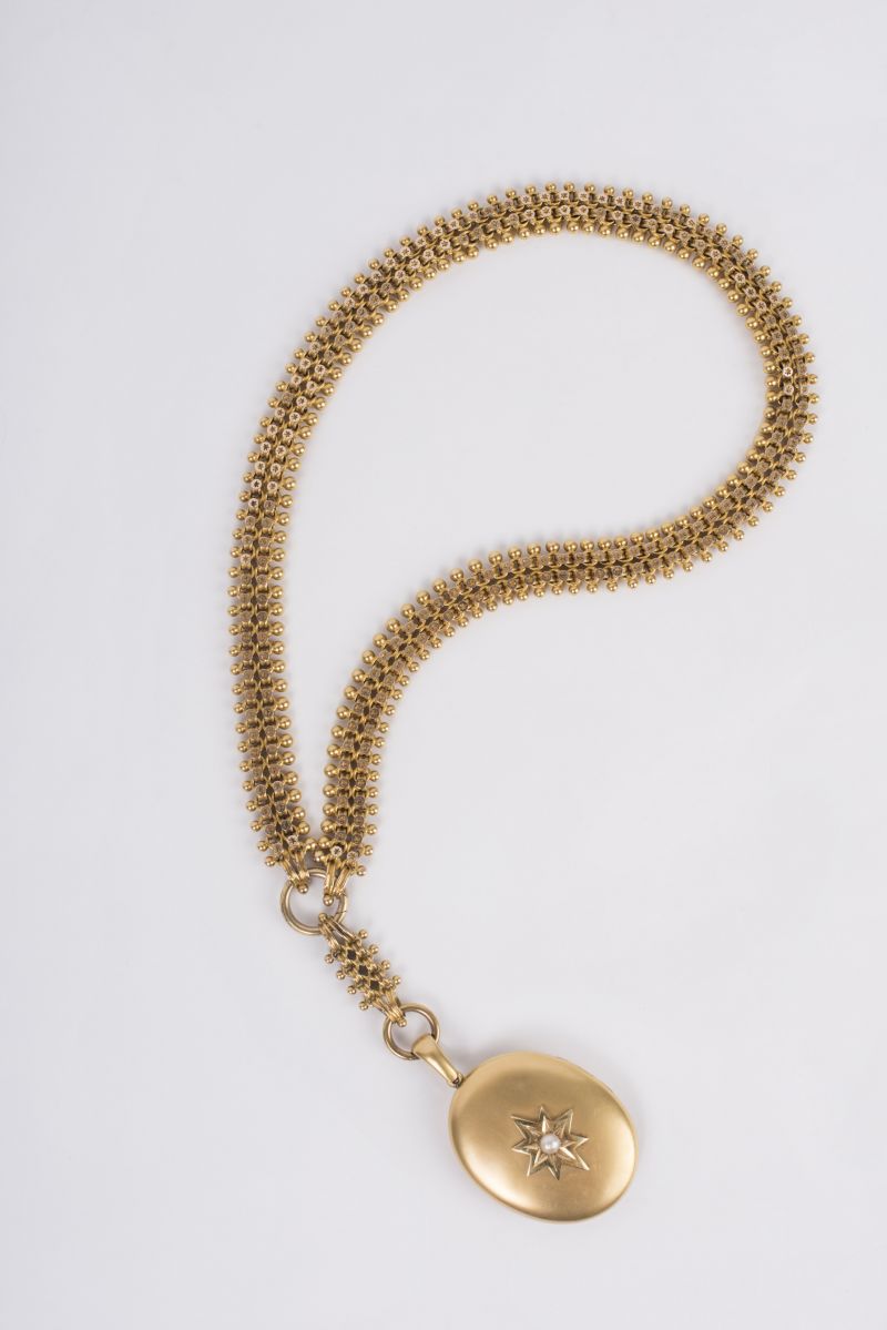 Estate 18K yellow gold bib necklace with 18K yellow gold Oval Pearl Locket, $7,175 at Croghan&#039;s Jewel Box