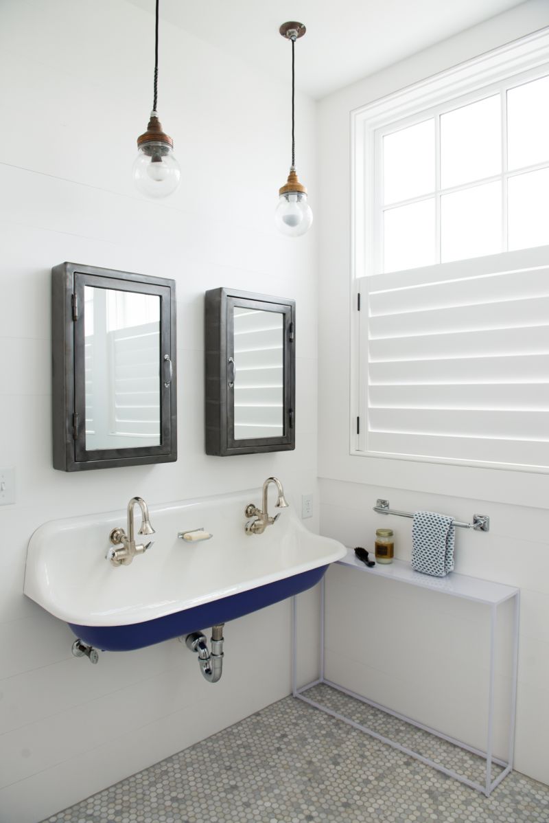 The girls each have a sunny ensuite bath complete with retro sinks.