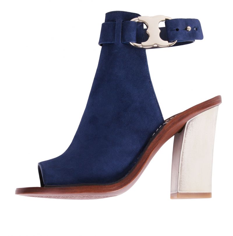Tory Burch’s suede “Gemini Link Peep-toe“ ($350 at Gwynn’s of Mount Pleasant) is one knockout example (how sexy is that horn-like resin heel?)
