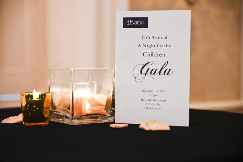 Flower pedals and candles added a sophisticated touch to the tables.