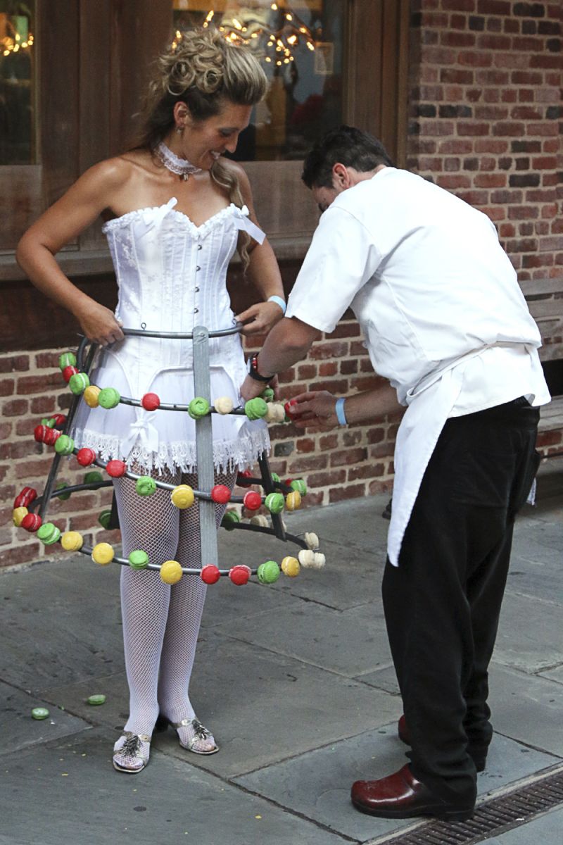 Sebastien Jack of Saveurs Du Monde Cafe pinned macaroons on a wire underskirt.