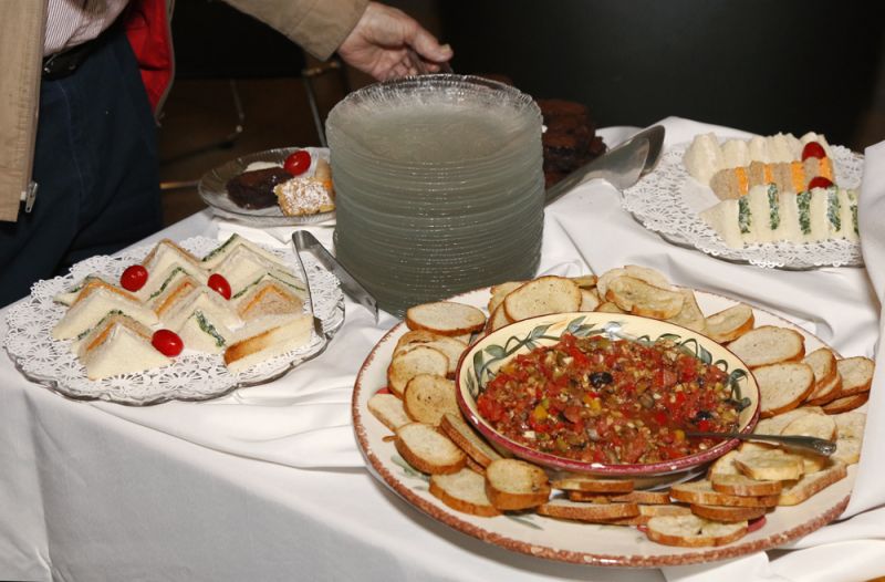 Tea sandwiches and other small bites were laid out on tables for gala guests.