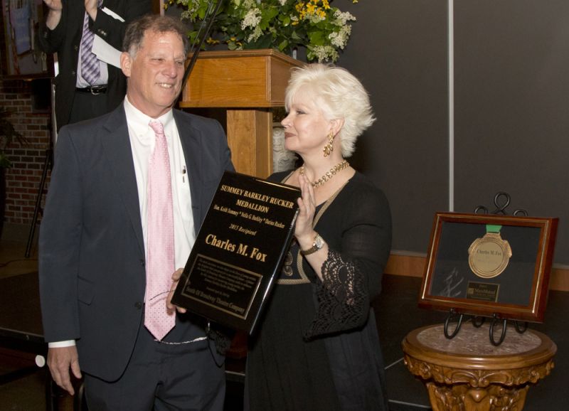 Mary Gould presented Charles Fox with the &quot;Summey Barkley Rucker Medallion&quot; award.