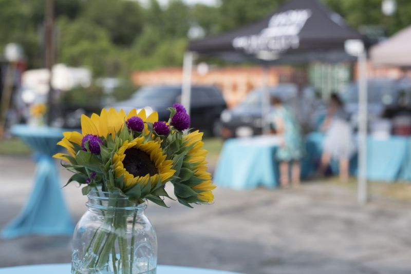 Sunflowers graced each table, offering a pop of color.