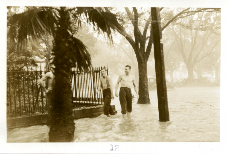 Wet Point Gardens: A hurricane in 1940 turned White Point Gardens into a waterway. Two men wade at the corner of Meeting and South Battery