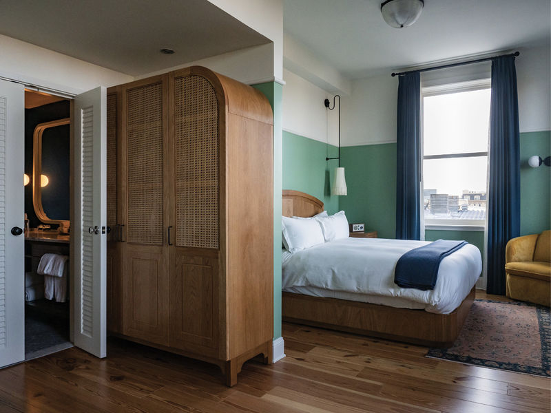 A fifth-floor guest room with downtown views