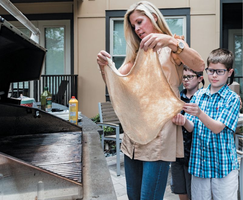 When grilling pizza, make sure to have your toppings ready, as the dough cooks quickly.