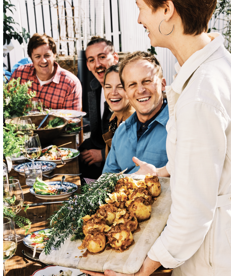 Much to the delight of fellow Basic Projects team members (from left) Jeremy Graves, Charles Layton, and Kate and Ben Towill, Eva Suarez reveals a new addition to the Post House sweets offerings, baked apples with sunchoke caramel and chantilly cream.