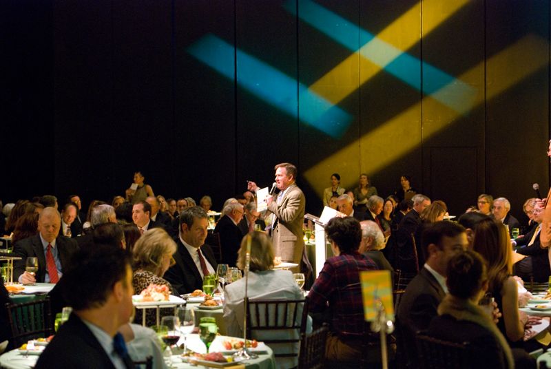 Guests participate in a vigorous live auction