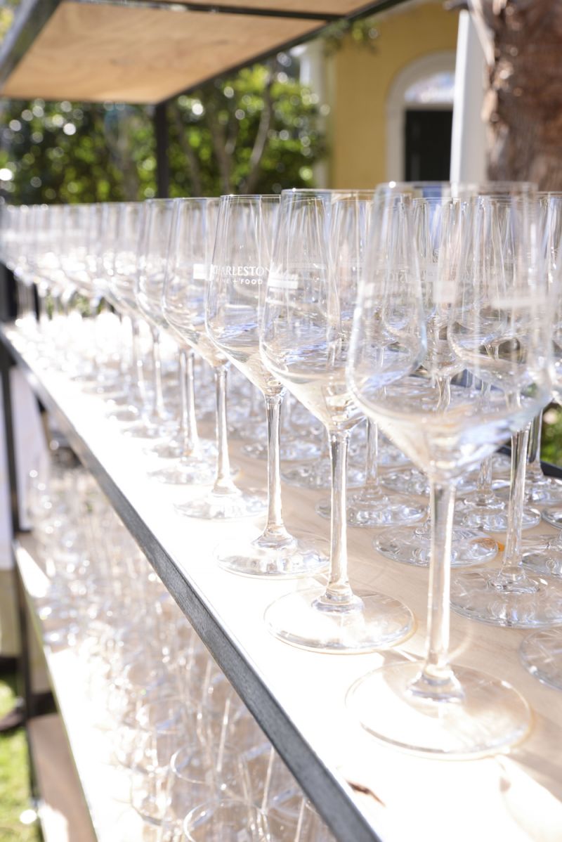 Upon entering, guests were handed a glass etched with the festival&#039;s logo.