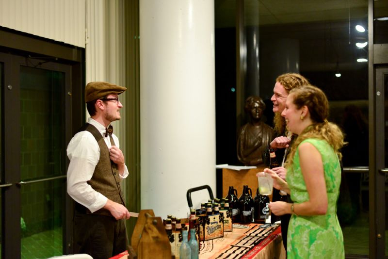 Partygoers chatted with a bartender from Palmetto Brewery.