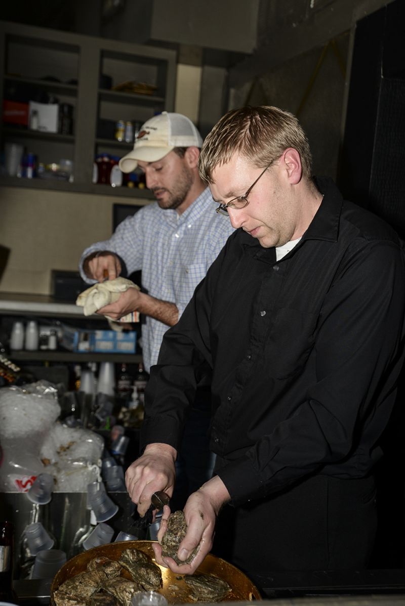 Trio staff, including James Burton and Joe Evans, shucked fresh oysters for guests.