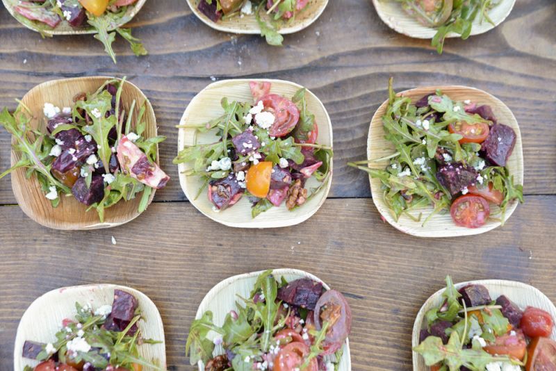 Heirloom tomato, smoked beet, and arugula salad with candied pecans, blue cheese, and a cider vinaigrette from the Fat Hen