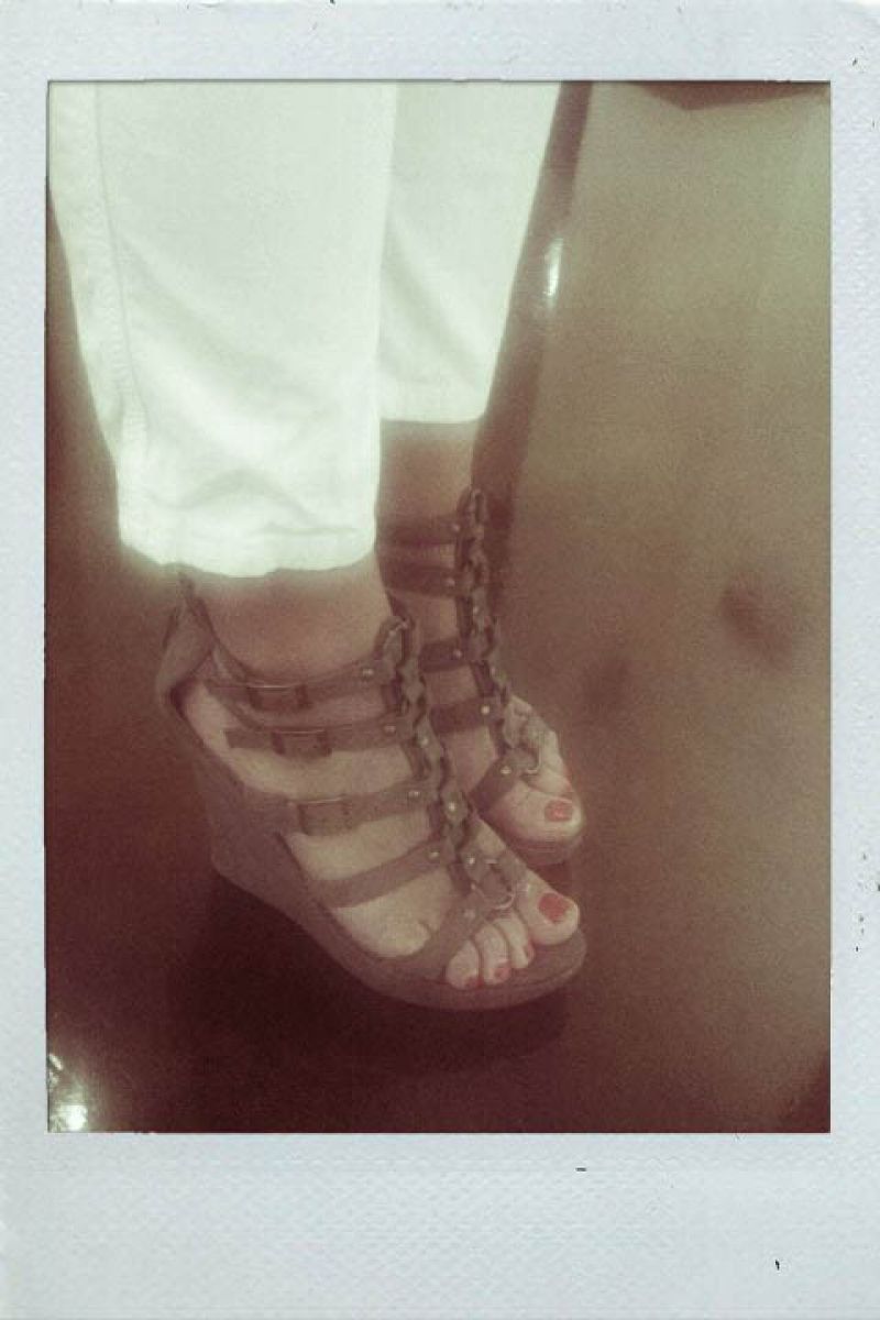 Liza in amazing grey strappy wedges.