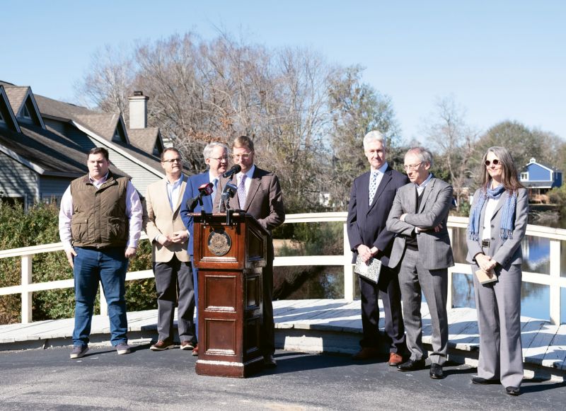 In January 2019, a press conference to introduce Dutch Dialogues was held in West Ashley, at an area of repeated flooding in the Church Creek basin. Mayor John Tecklenburg (third from left) asserted his commitment to solving flooding problems. To his left: Winslow Hastie, CEO of Historic Charleston Foundation, as well as Dutch Dialogues consultants Dale Morris, David Waggonner, and Janice Barnes.