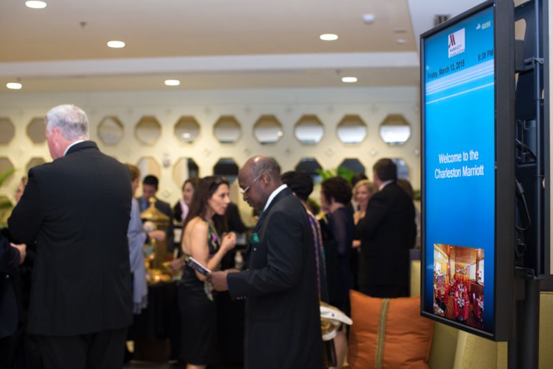 Guests mingled while viewing the silent auction.