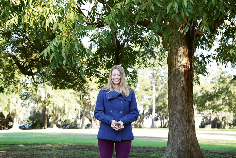 Chef Chelsey Conrad stands under a pecan tree at Boone Hall Plantation, once the largest pecan producer in America. (Photo by Brittany Nailon)