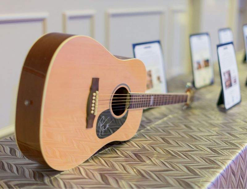 Darius Rucker signed a guitar as part of the live auction package “A Little Bit Country, A Little Bit Rock’n’Roll.”