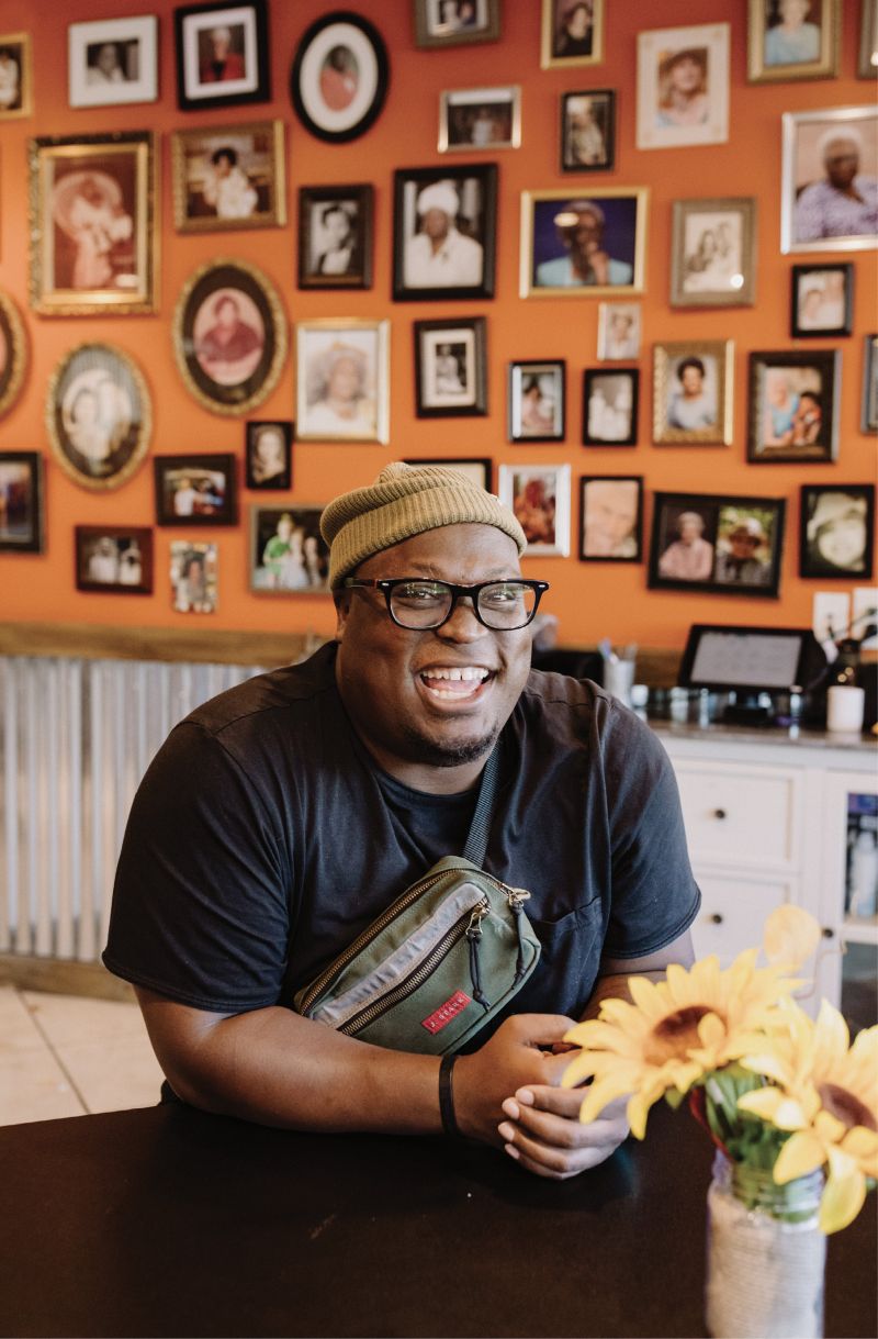 Taste making: KJ Kearney (right, at  Gillie’s Seafood on James Island) founded Black Food Fridays in April 2020 to encourage diners to support Black-owned restaurants, most of which have been pushed off the peninsula. He says the culinary scene will continue to expand into the suburbs.