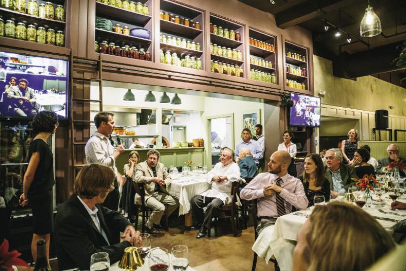 California-based winemaker Patrick Saboe tells his Frank Lee stories to the night’s crowd. Patrick, a waiter at the Colony House in 1991 when Lee joined Dick Elliott and David Marconi there as chef, helped open SNOB in ’93 and, as Lee says, “was part of the ‘Gang of Four’ waiters that ruled the floor.”