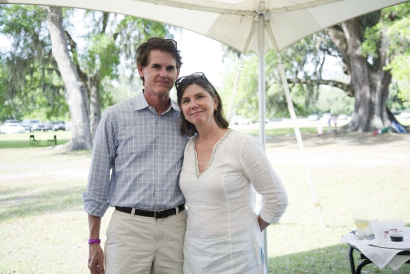 Tom and Theresa Evans enjoy shade under the tent.